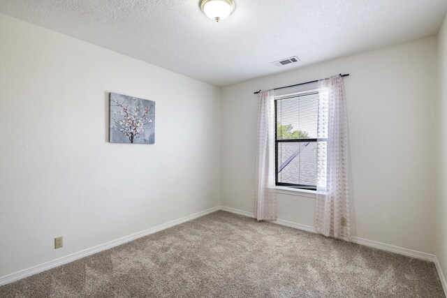 8712 Greenarbor Rd NE, Albuquerque, NM 87122 - unfurnished room with carpet floors and baseboards
