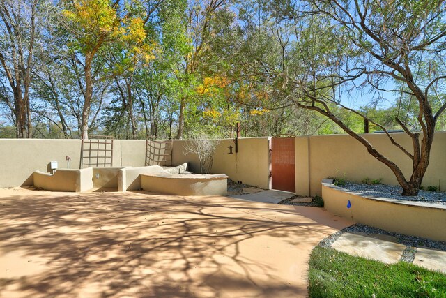 120 Espinosa Rd, Corrales, NM 87048 - view of patio / terrace featuring a gate