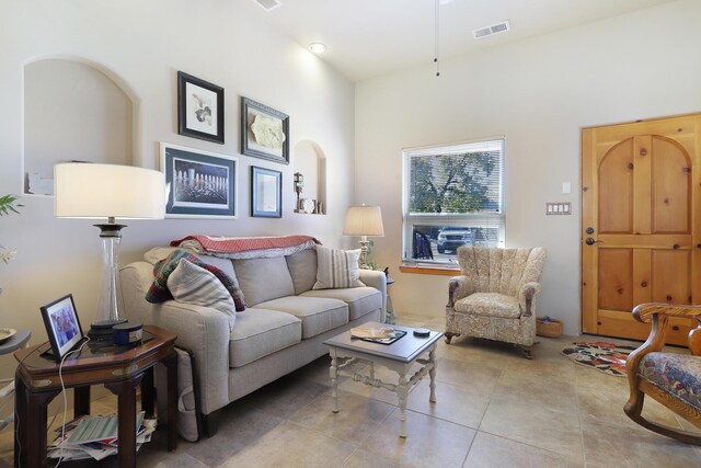 120 Espinosa Rd, Corrales, NM 87048 - living area featuring tile patterned floors and arched walkways