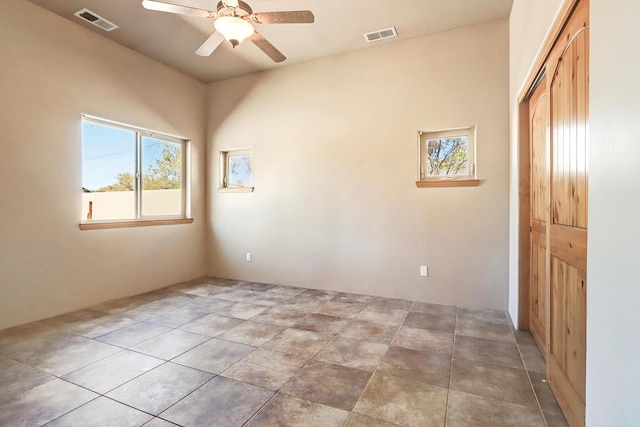 120 Espinosa Rd, Corrales, NM 87048 - unfurnished bedroom with a closet and a ceiling fan