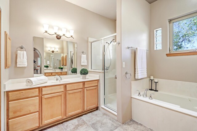 120 Espinosa Rd, Corrales, NM 87048 - bathroom with a bath, a stall shower, and vanity