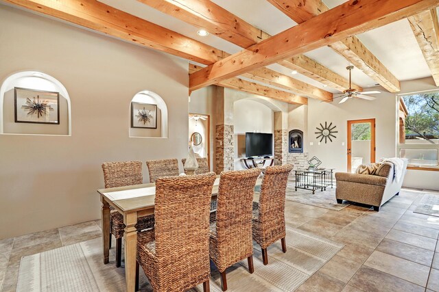 120 Espinosa Rd, Corrales, NM 87048 - dining space featuring arched walkways, beam ceiling, ceiling fan, and recessed lighting