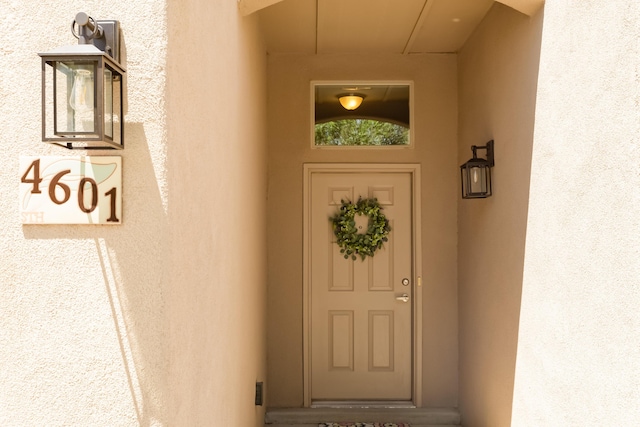 4601 Mi Cordelia Dr NW, Albuquerque, NM 87120 - view of exterior entry featuring stucco siding