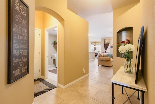 4601 Mi Cordelia Dr NW, Albuquerque, NM 87120 - hall with tile patterned floors and arched walkways