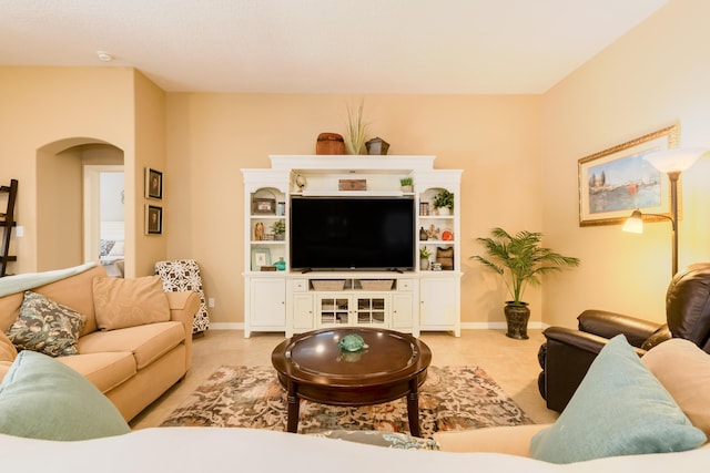 4601 Mi Cordelia Dr NW, Albuquerque, NM 87120 - living area featuring arched walkways and baseboards