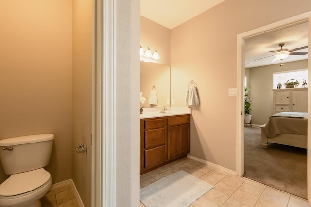 4601 Mi Cordelia Dr NW, Albuquerque, NM 87120 - ensuite bathroom featuring vanity, tile patterned flooring, and ceiling fan