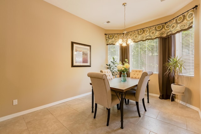 4601 Mi Cordelia Dr NW, Albuquerque, NM 87120 - dining area with a chandelier and light tile patterned floors