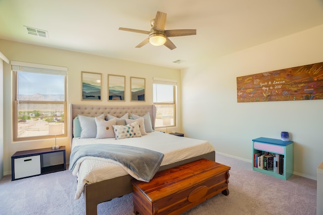 4381 Lauren Loop NE, Rio Rancho, NM 87124 - carpeted bedroom with baseboards and ceiling fan