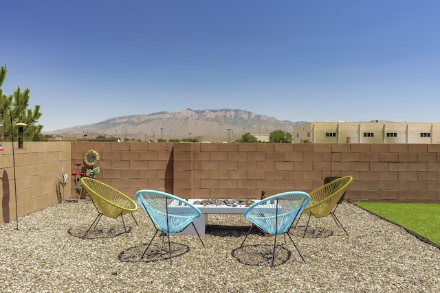 4381 Lauren Loop NE, Rio Rancho, NM 87124 - fenced backyard featuring a mountain view