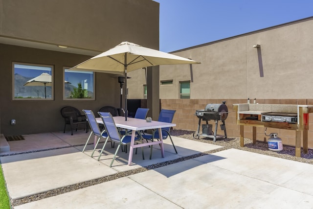 4381 Lauren Loop NE, Rio Rancho, NM 87124 - view of patio featuring outdoor dining space and area for grilling