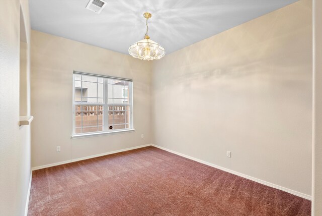 10431 Crosscut Dr NW, Albuquerque, NM 87114 - unfurnished room with a chandelier and carpet floors