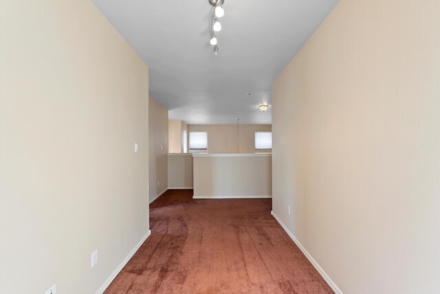 10431 Crosscut Dr NW, Albuquerque, NM 87114 - carpeted empty room with baseboards