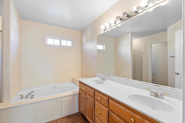 10431 Crosscut Dr NW, Albuquerque, NM 87114 - bathroom featuring double vanity, a bath, and a shower stall