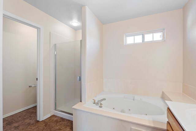 10431 Crosscut Dr NW, Albuquerque, NM 87114 - bathroom featuring a shower stall, a jetted tub, and vanity