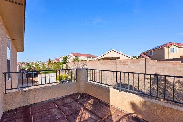 10431 Crosscut Dr NW, Albuquerque, NM 87114 - view of patio / terrace featuring a residential view