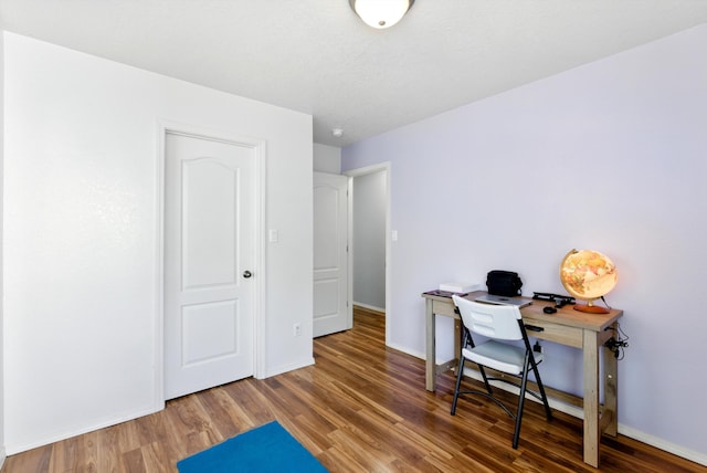 10636 Mcmichael Ln SW, Albuquerque, NM 87121 - home office featuring wood finished floors and baseboards