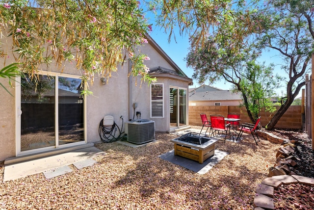 10636 Mcmichael Ln SW, Albuquerque, NM 87121 - fenced backyard with a patio area and a fire pit