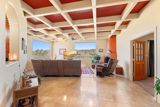 3 Seasons Cir, Placitas, NM 87043 - living area featuring healthy amount of natural light, ceiling fan, coffered ceiling, beamed ceiling, and light tile patterned floors