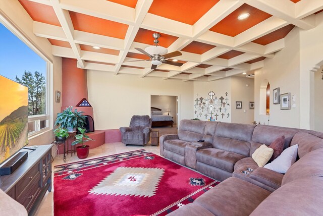 3 Seasons Cir, Placitas, NM 87043 - living room with arched walkways, coffered ceiling, ceiling fan, beam ceiling, and recessed lighting