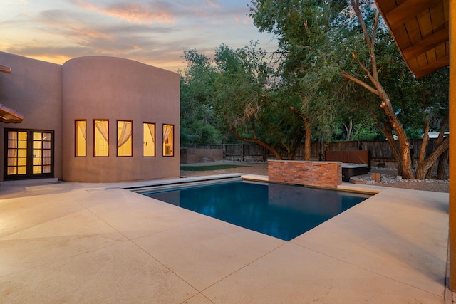 9005 4th St NW, Albuquerque, NM 87114 - view of pool with a patio area, a fenced backyard, and french doors