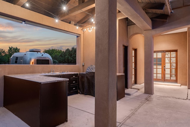 9005 4th St NW, Albuquerque, NM 87114 - view of patio featuring french doors and an outdoor kitchen