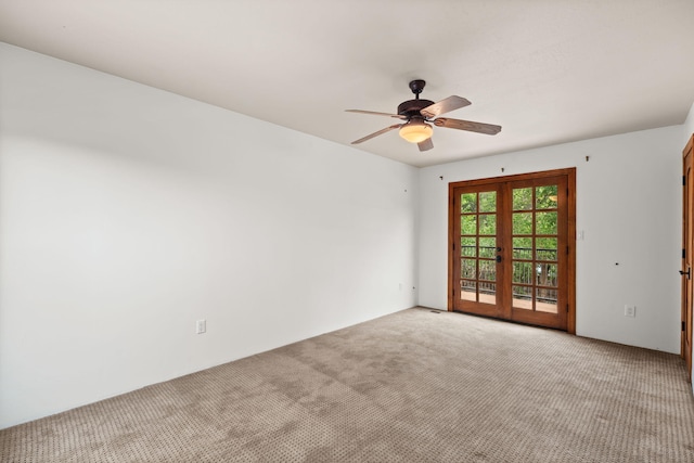9005 4th St NW, Albuquerque, NM 87114 - spare room with light carpet, ceiling fan, and french doors