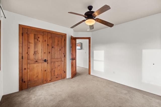 9005 4th St NW, Albuquerque, NM 87114 - unfurnished bedroom featuring carpet flooring, a ceiling fan, and a closet