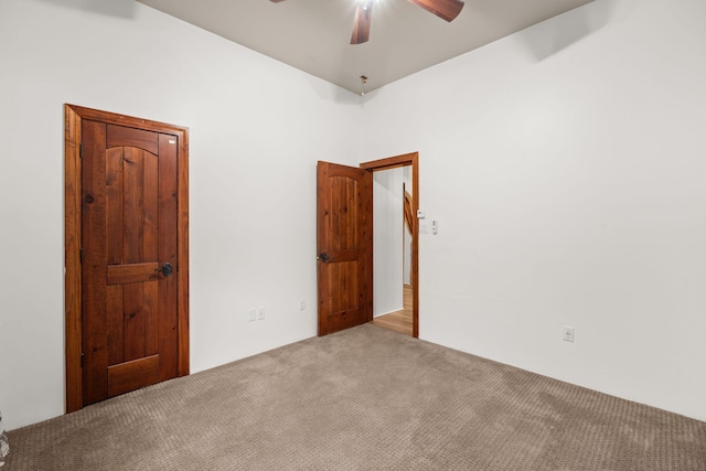 9005 4th St NW, Albuquerque, NM 87114 - carpeted empty room with a ceiling fan