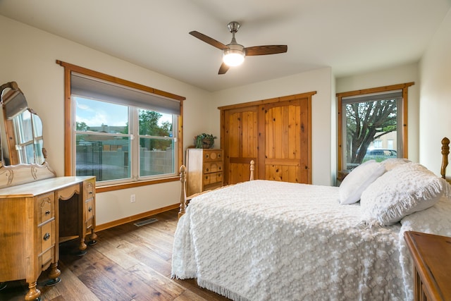 6816 Tamarisk Pl NW, Albuquerque, NM 87120 - bedroom with wood finished floors, ceiling fan, and access to exterior
