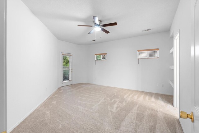 3912 Tundra Swan Ct NW, Albuquerque, NM 87120 - carpeted empty room with a ceiling fan