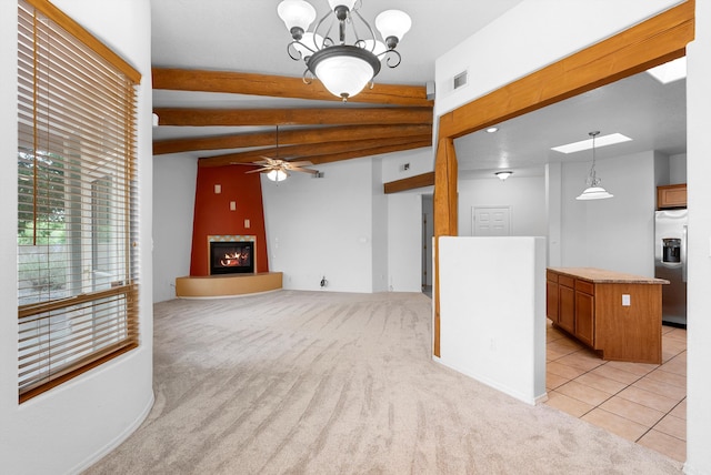 3912 Tundra Swan Ct NW, Albuquerque, NM 87120 - unfurnished living room featuring a ceiling fan, light carpet, a glass covered fireplace, and light tile patterned floors
