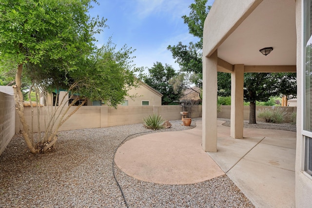 3912 Tundra Swan Ct NW, Albuquerque, NM 87120 - fenced backyard with a patio area