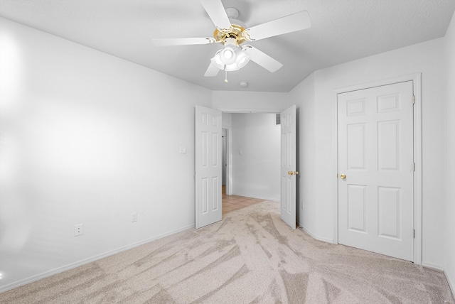 3912 Tundra Swan Ct NW, Albuquerque, NM 87120 - unfurnished bedroom featuring light colored carpet and a ceiling fan