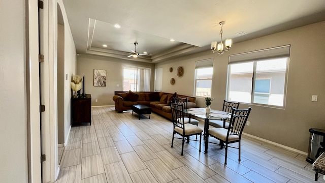 415 Adeline Ave, Los Lunas, NM 87031 - dining space with a raised ceiling, ceiling fan, recessed lighting, and wood tiled floors