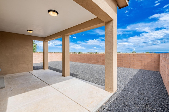 4289 Crowned Eagle Loop NE, Rio Rancho, NM 87144 - fenced backyard featuring a patio