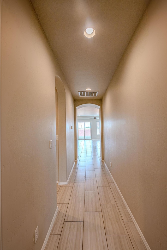 4289 Crowned Eagle Loop NE, Rio Rancho, NM 87144 - corridor featuring arched walkways and recessed lighting