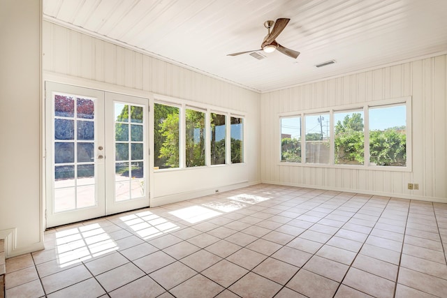 2600 Virginia St NE, Albuquerque, NM 87110 - unfurnished room with light tile patterned floors, a ceiling fan, and french doors