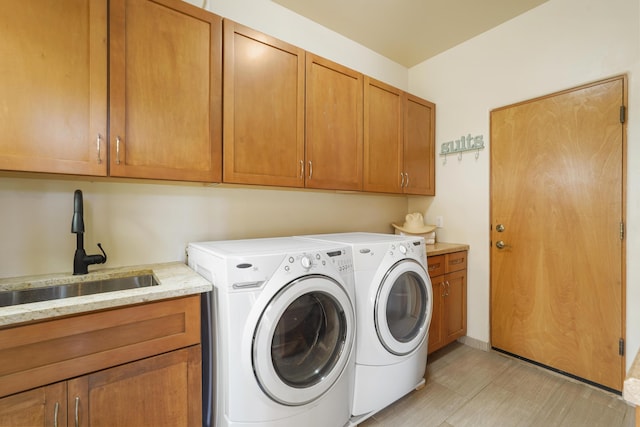 651 Calle De Blas, Corrales, NM 87048 - laundry area with cabinet space and washer and dryer