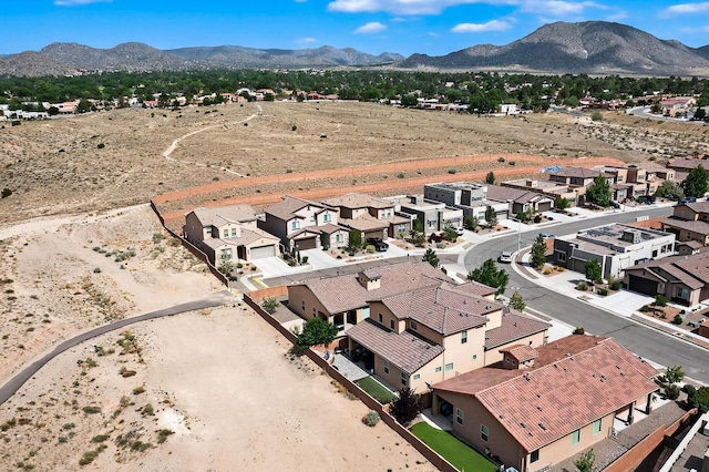 1501 Barbaro Dr SE, Albuquerque, NM 87123 - aerial perspective of suburban area featuring a mountainous background