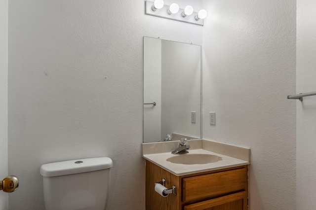 7316 Portulaca Dr NW, Albuquerque, NM 87120 - bathroom with vanity and toilet