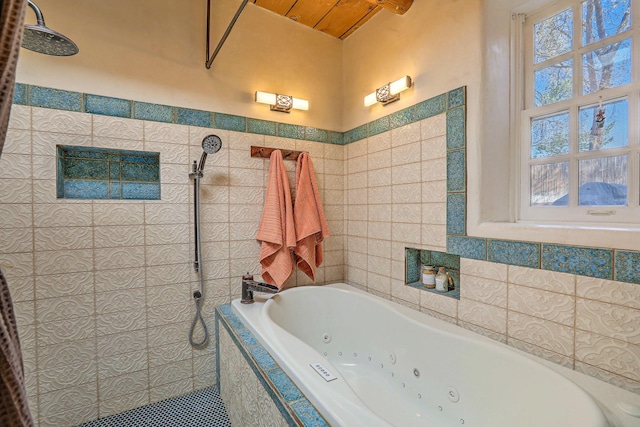 78 Quirks Ln, Corrales, NM 87048 - full bath with tile walls, a jetted tub, plenty of natural light, a walk in shower, and tile patterned flooring