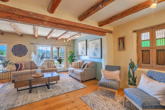 78 Quirks Ln, Corrales, NM 87048 - living area featuring beam ceiling and light wood finished floors