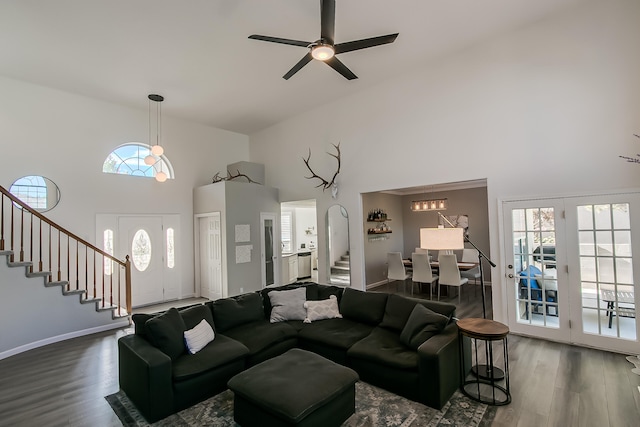 6109 Chamblee Ct NE, Albuquerque, NM 87111 - living room with high vaulted ceiling, stairs, wood finished floors, and ceiling fan