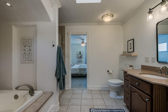 6109 Chamblee Ct NE, Albuquerque, NM 87111 - bathroom featuring a garden tub, vanity, a textured ceiling, tile patterned floors, and crown molding