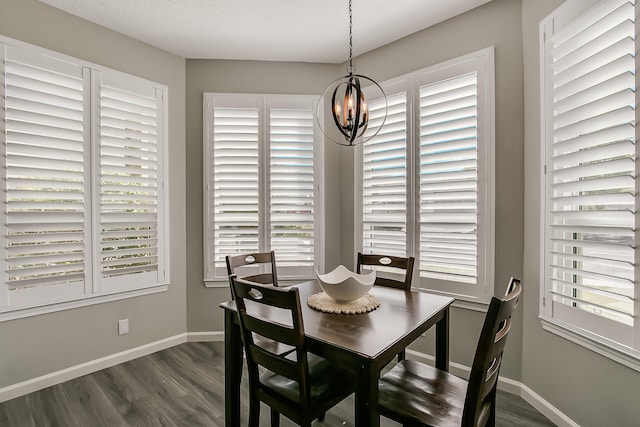 6109 Chamblee Ct NE, Albuquerque, NM 87111 - dining space featuring a chandelier and dark wood-type flooring