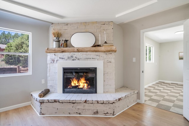 7 Corte De Canoncito, Cedar Crest, NM 87008 - detailed view of a brick fireplace and wood finished floors