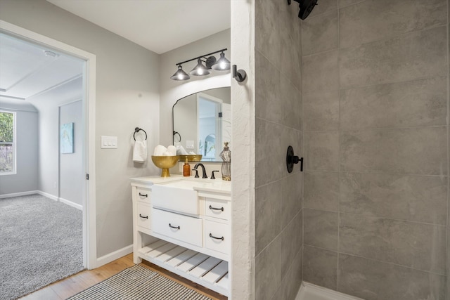 7 Corte De Canoncito, Cedar Crest, NM 87008 - bathroom with vanity, wood finished floors, and tiled shower