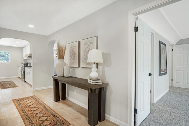 7 Corte De Canoncito, Cedar Crest, NM 87008 - corridor featuring arched walkways, light wood-style floors, and recessed lighting