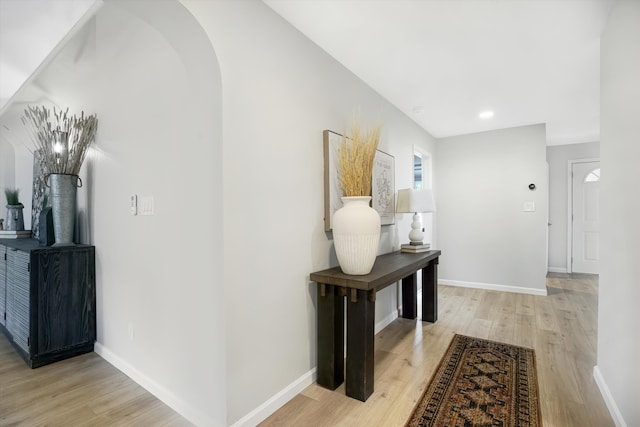 7 Corte De Canoncito, Cedar Crest, NM 87008 - hallway featuring light wood finished floors and arched walkways