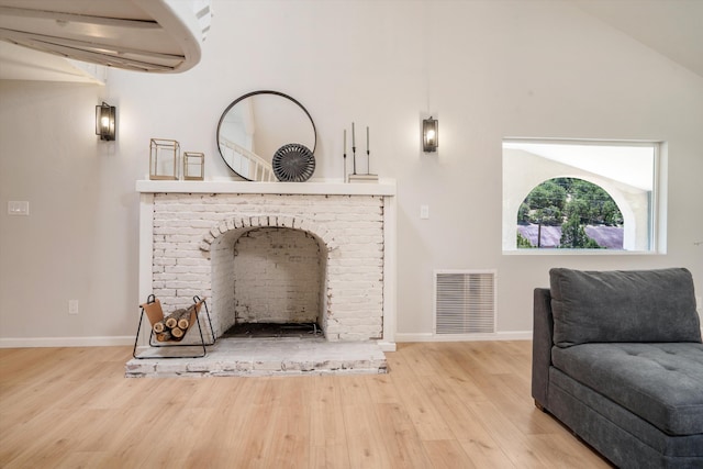 7 Corte De Canoncito, Cedar Crest, NM 87008 - living area featuring an AC wall unit and wood finished floors
